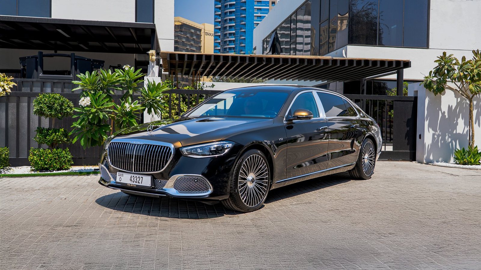 Black Mercedes-Maybach S680 from the Dynasty Prestige fleet parked at a Dubai villa forecourt, prepared for handover