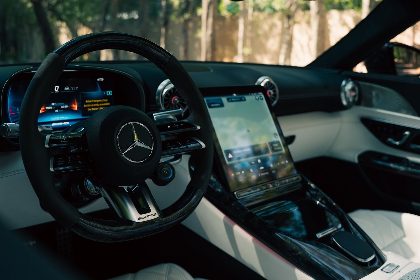 Mercedes-AMG SL63 cockpit from the Dynasty Prestige fleet lit at night before an evening handover