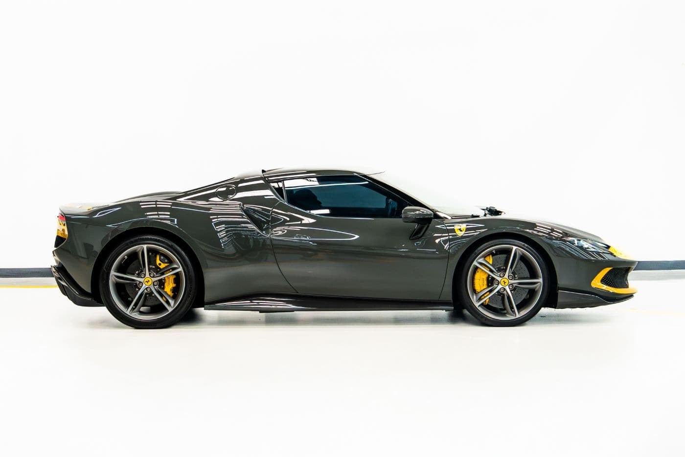 Ferrari 296 GTS grey side profile with yellow accents