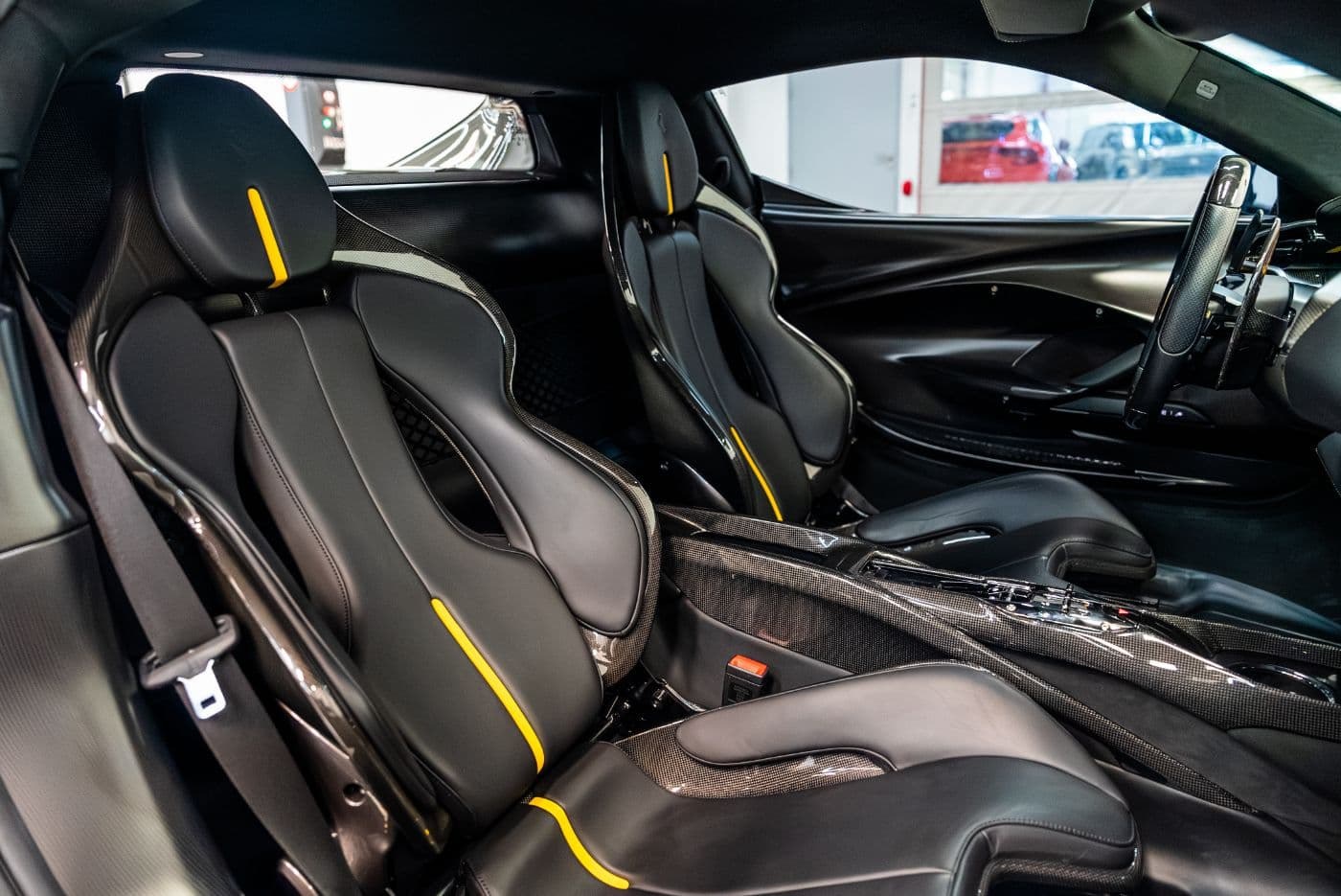 Ferrari 296 GTS black cabin seats with yellow accents