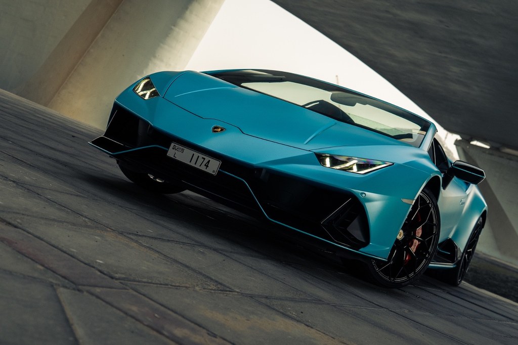 Turquoise Lamborghini Huracan EVO Spyder available to rent in Dubai